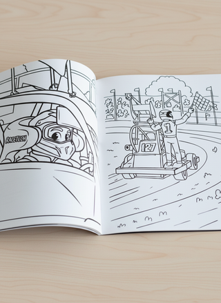 Close-up of book spread showing race car details